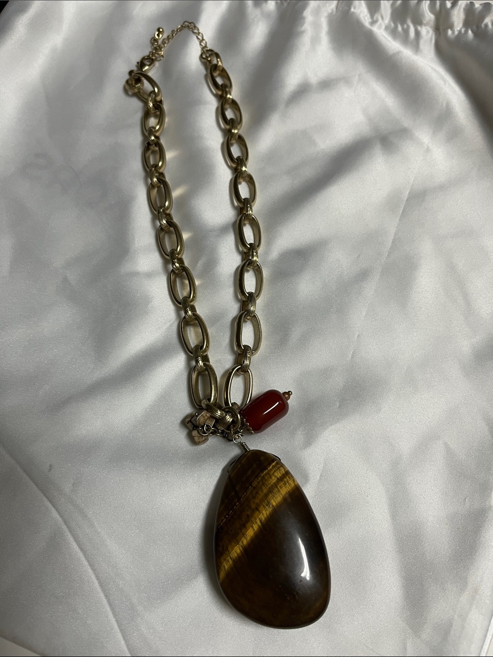 Tigers eye pendant retired Lia Sophia necklace. Kiam Family